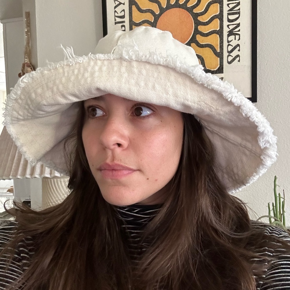 Cream distressed bucket hat